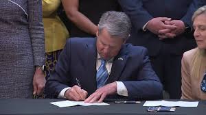 Brian Kemp Signing